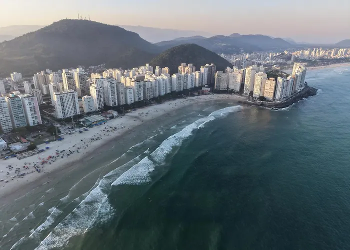 Suítes Pitangueiras - POUSADA FRENTE MAR Guarujá